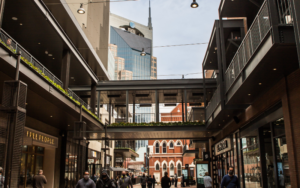 An exterior shot of a shopping strip.