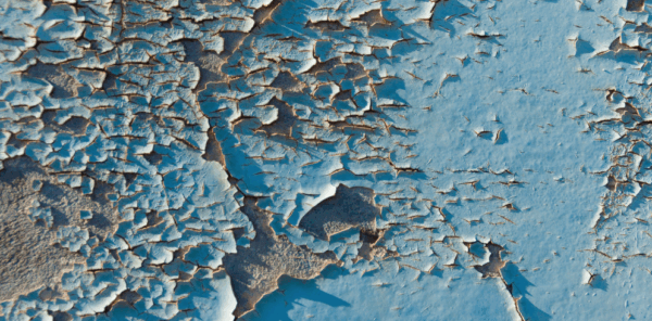 paint peeling from a building exterior