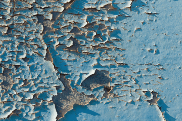 paint peeling from a building exterior